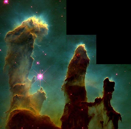 KOSMOS  - 607px-Eagle_nebula_pillars.jpg