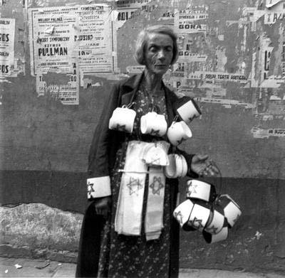 Getto - A Woman Selling Armbands in the Ghetto.jpg